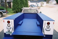 Spray on bedliner material added to contractor's vehicle.